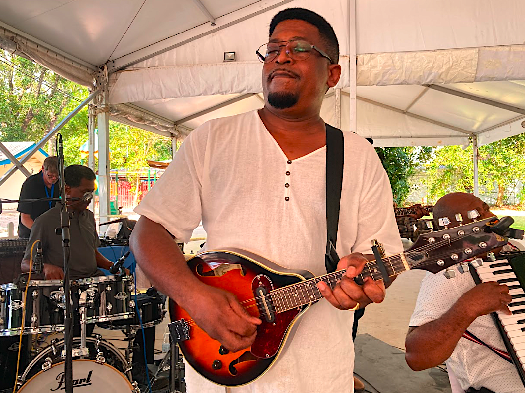Cyril Vital on mandolin guitar, Mahé, 11/25.