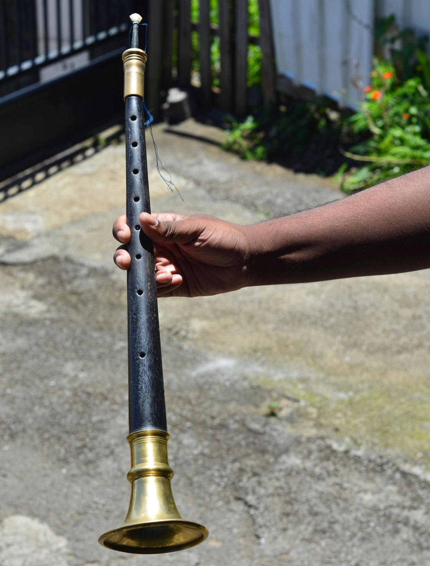 Oboe that travelled from India to Reunion around 1880. The instrument is being held by Sullivan Mounichy, La Saline-les-Hauts, January 2022. Photo by William Tallotte